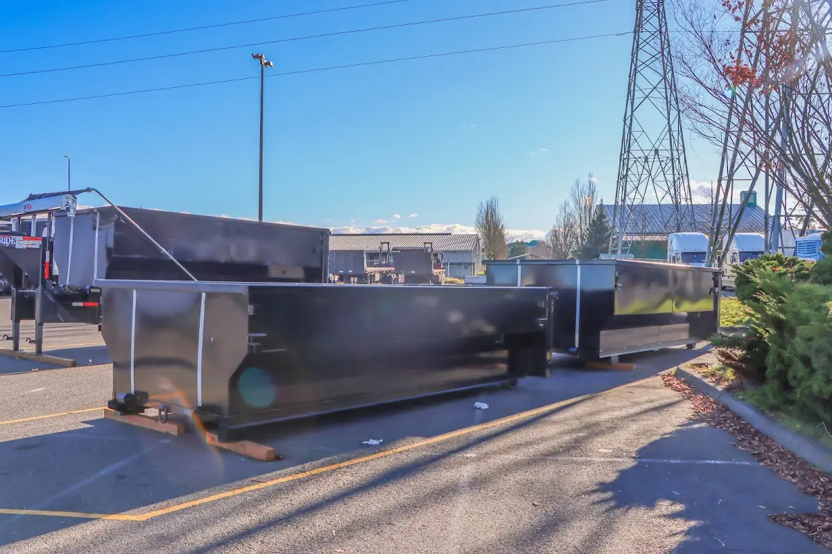Roll-off dumpster ready for waste disposal at job site for 2 Yard Dumpster Rental in Windsor
